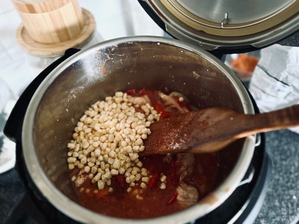 Instant pot with stew and sweetcorn added 