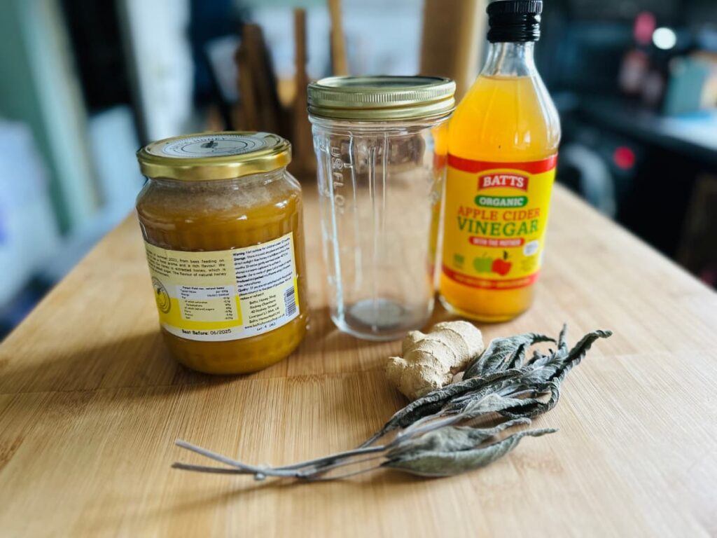 Collected ingredients for a sage and ginger oxymel