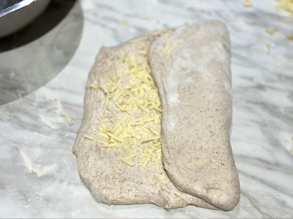 Folded dough containing cheese