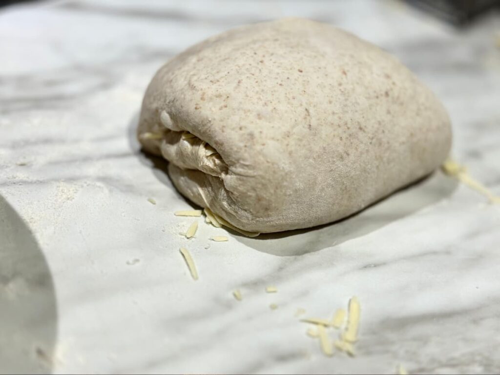 Rolled ball of dough on a worksurface